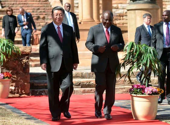 President Cyril Ramaphosa walking with President of China Xi Jinping