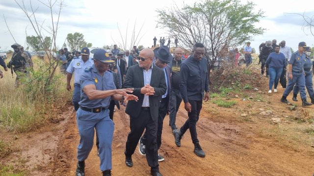 Police Minister Senzo Mchunu arrives in Stilfontein