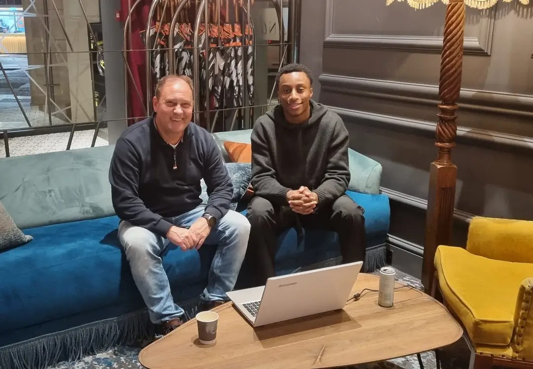 Warriors coach Marian Marinica engages Liverpool defender Isaac Mabaya